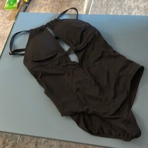 Sexy black one piece! Low cut in the back and the front!